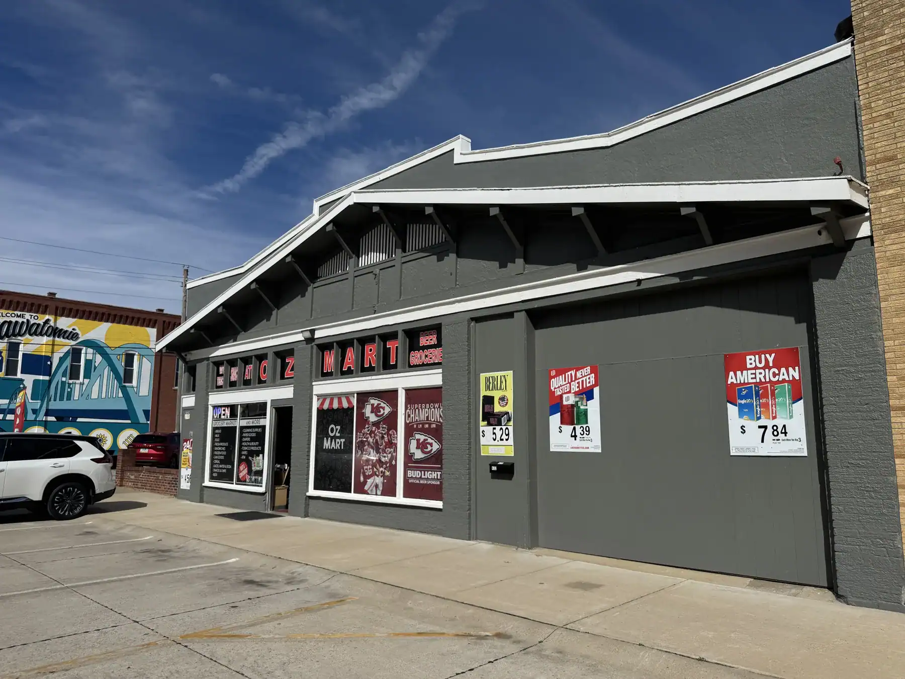 Exterior view of a commercial building featuring Cordura RE fabric used in the facade, showcasing its durability and modern design in an urban retail setting.