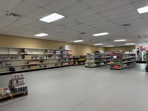 Interior view of a retail store showcasing various products made with Cordura RE fabric on shelves and displays.