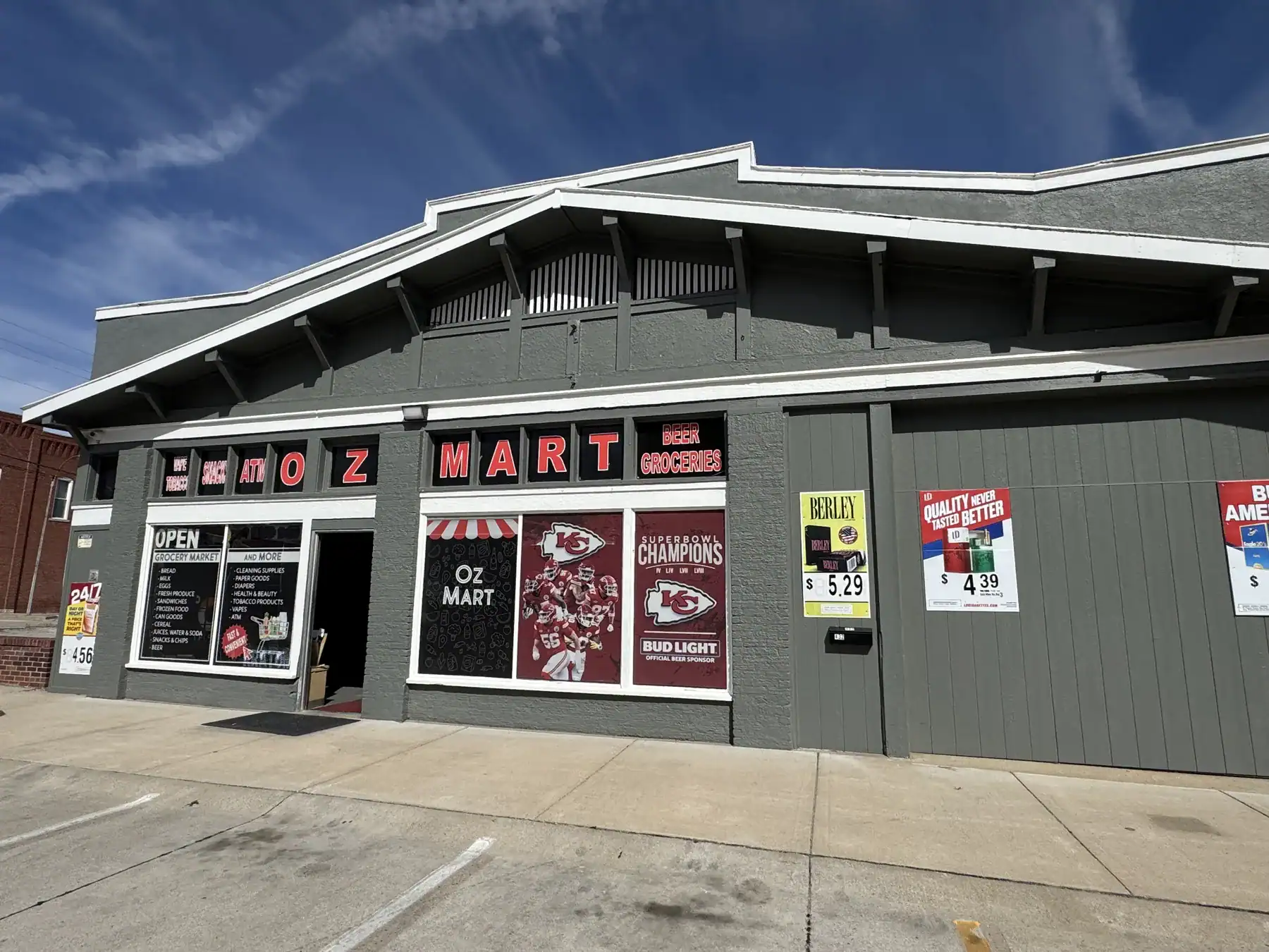 Exterior view of a retail store specializing in Cordura RE durable fabrics, showcasing the storefront with signage and promotional posters for outdoor and industrial fabric applications.